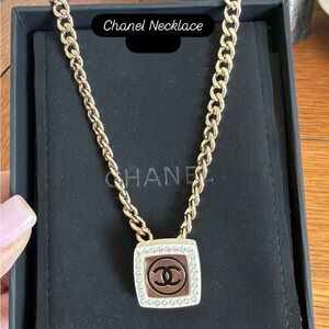 CHANEL Gold Necklace with Silver Accents